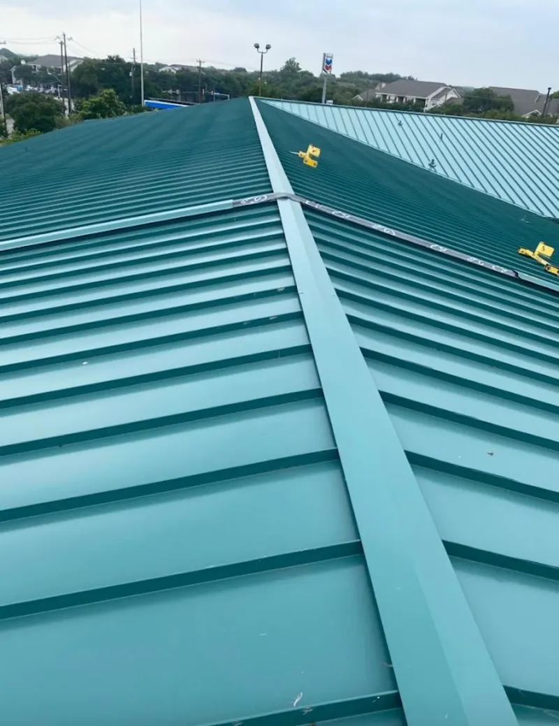 Green commercial metal roof ridge and valley for Metal Roof Repair in Artondale